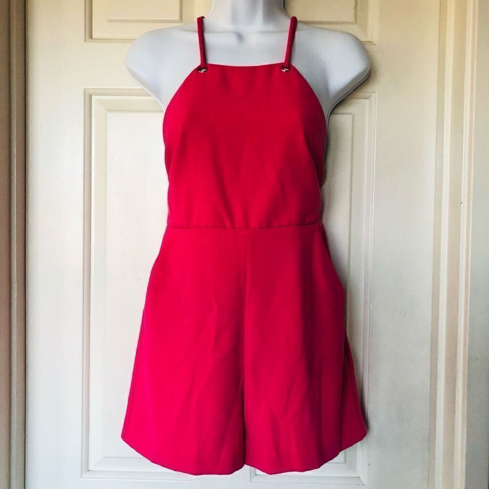 Bebe Hot Pink Spaghetti Strap Halter Cross Back Romper